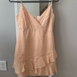 Orange and white checkered dress